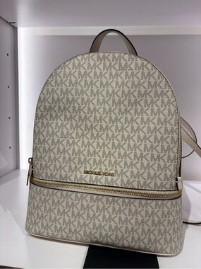 Michael Kors Denim Blue MK Monogram Rhea Backpack Medium cream new